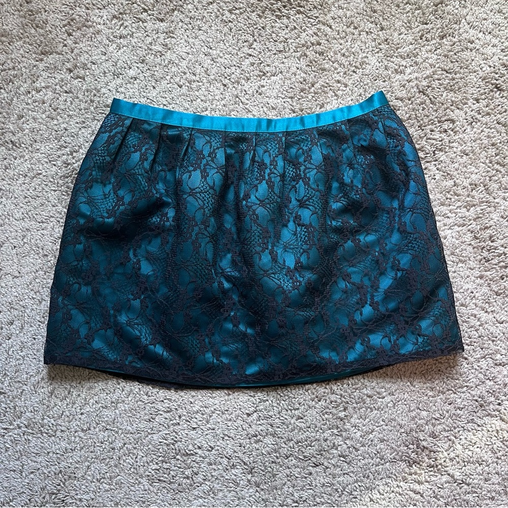 Forever 21 dark green bubble mini skirt with black lace overlay